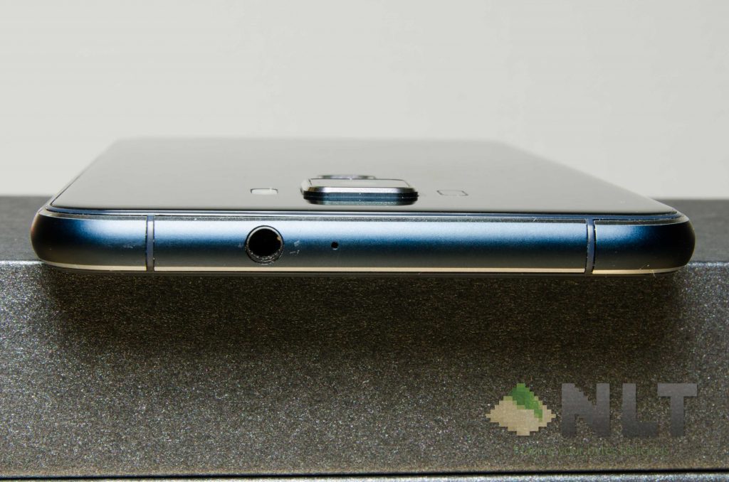 Yes, the 3.5mm audio jack is still there.