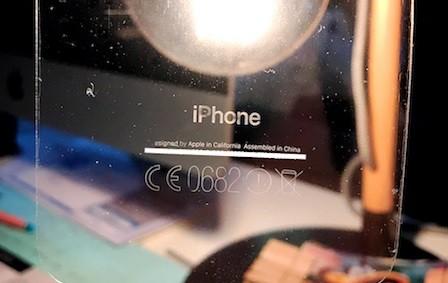 This is what happens when a wrap is pulled off of the Jet Black iPhone 7. The writings are transferred onto the wrap itself! Photo: Ksyu/MacRumors