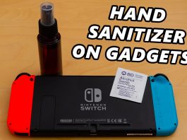 Cleaning gadgets smartphones with hand sanitizer