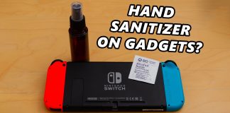 Cleaning gadgets smartphones with hand sanitizer