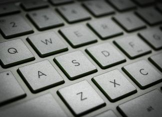 5 Ergonomic Tips for Typing Safely gray keypad