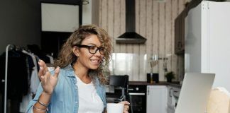woman using laptop doing a video call