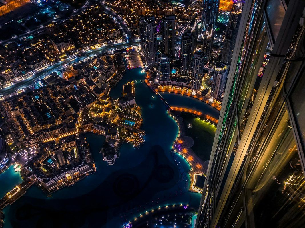 pexels-photo-1467300 aerial photography of cityscape at nighttime