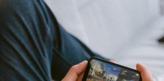 person holding black android smartphone