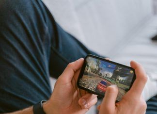 How To Improve Precision and Comfort When Gaming On Your Mobile person holding black android smartphone
