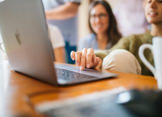 close up photo of woman using laptop