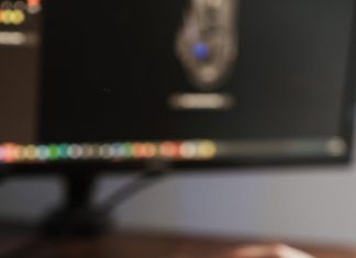 Why Windows PCs Remain a Major Privacy Target crop person working on computer and using mouse