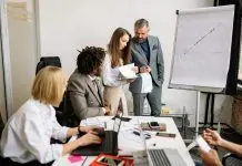 people discussing in a conference room