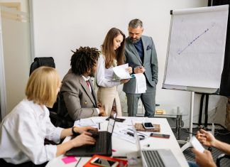 people discussing in a conference room