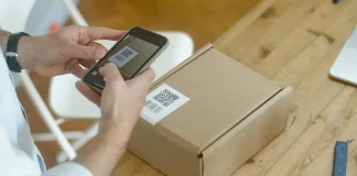 person taking photo of the qr code