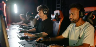 young men playing games with computers