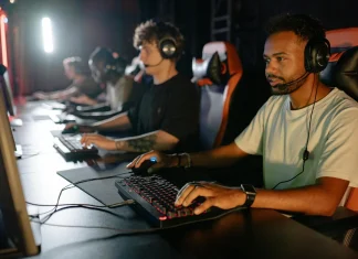 young men playing games with computers