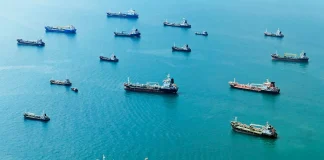 aerial view of cargo ships on open sea