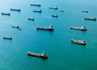 The Hidden Dangers of Global Trade and How You Can Protect Your Business from Financial Loss aerial view of cargo ships on open sea