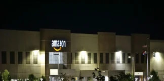 amazon concrete building during night time