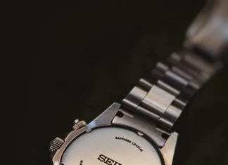 close up of seiko watch back with steel bracelet