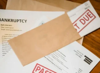 What To Do When Minimum Payments Dominate Your Income past due and bankruptcy papers on table